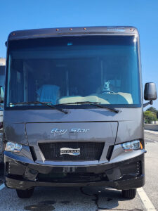 Roo, a very ambitious Jack Russel, is ready to roll in the drivers seat of his families motorcoach waiting to board the Ferry in Cape May