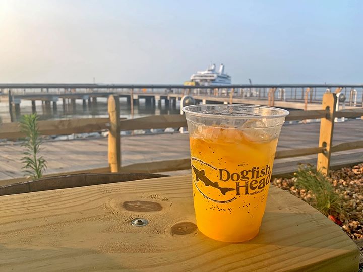 A Dogfish Head beverage enjoyed by the deck of the Lewes Terminal, watching as the ferry arrives