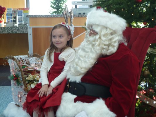 Santa Greets a Child at the Cape May - Lewes Ferry